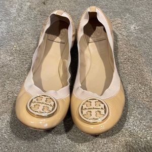 Tory Burch flats in size 9.5 with gold and nude emblem.